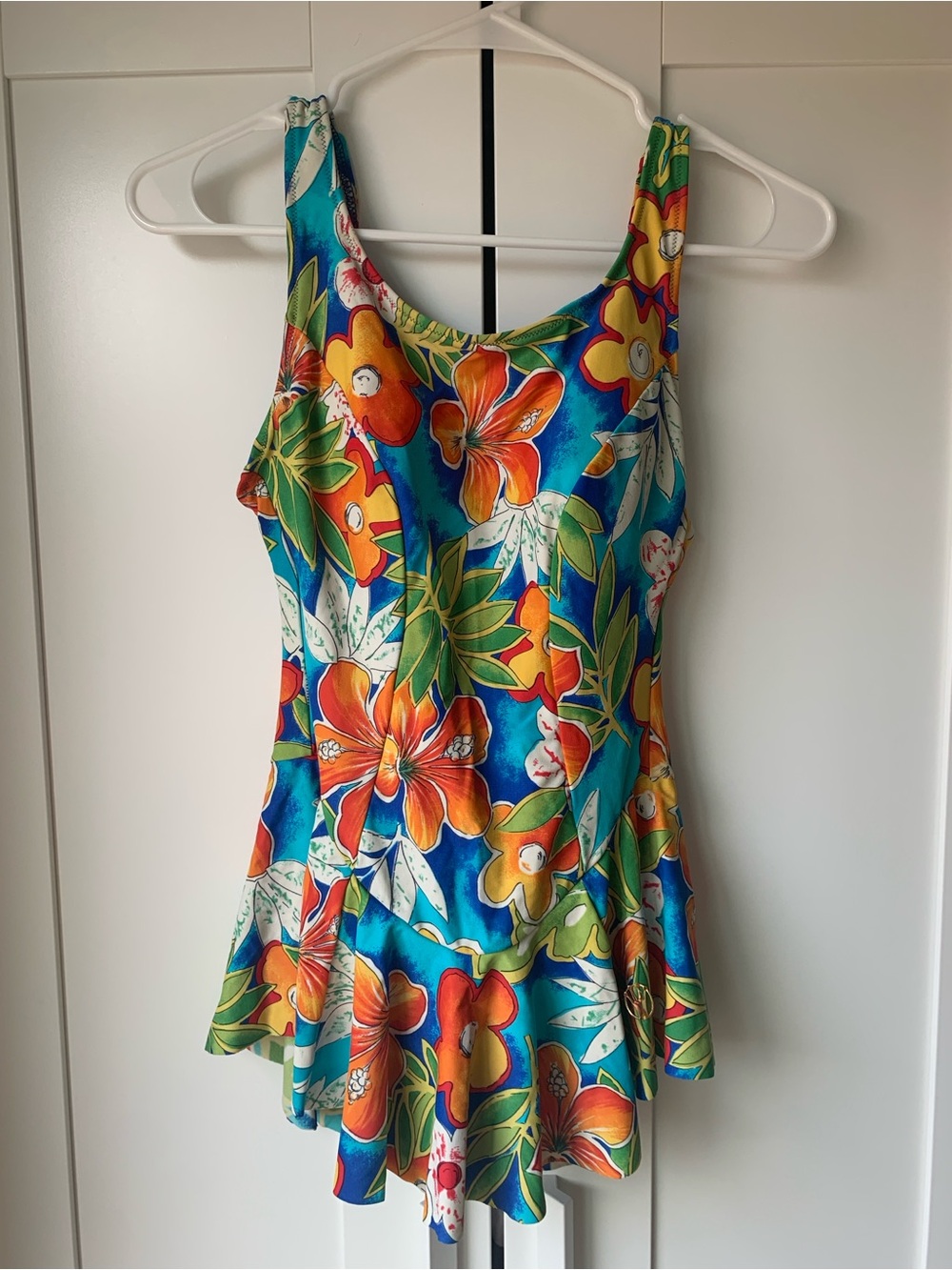 NWOT Vibrant Multicolor Floral Swimdress with Gold Tone logo Accent